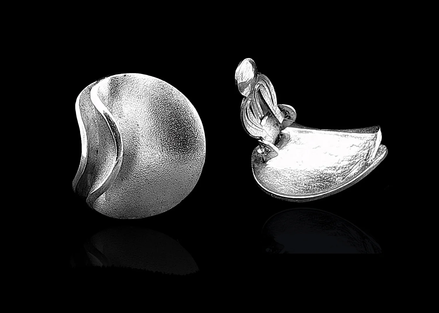 N E From frosted silver clip earrings