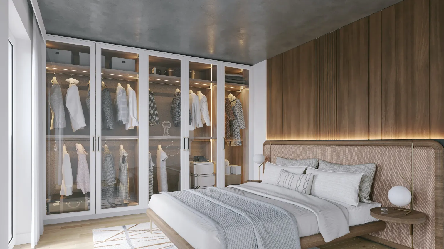 Modern bedroom with a large bed featuring light gray bedding, wooden headboard, and bedside tables with spherical lamps, adjacent to a wardrobe with glass doors showcasing neatly hung clothes.