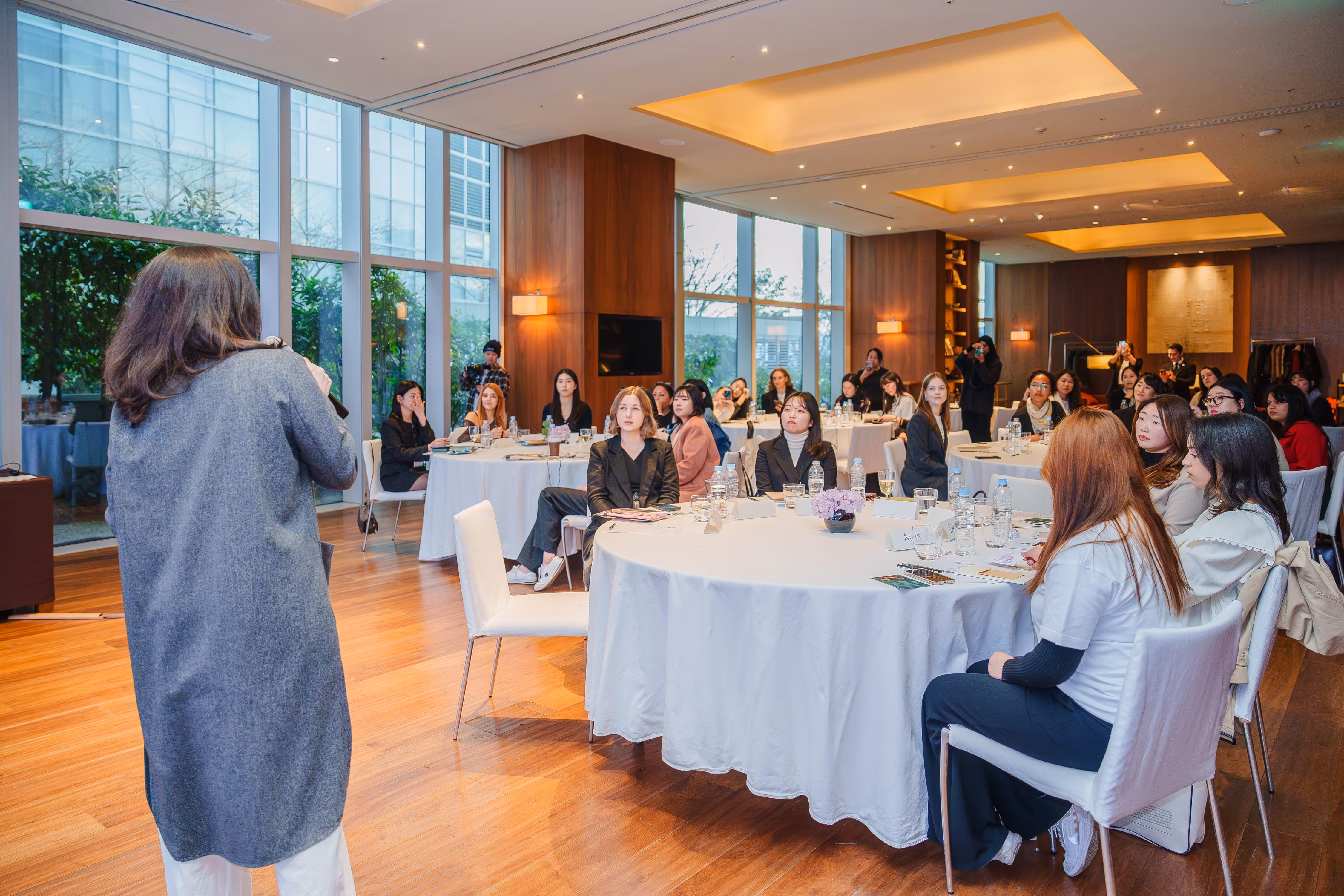 Picture of a women-focused indoor conference organized by NomadHer