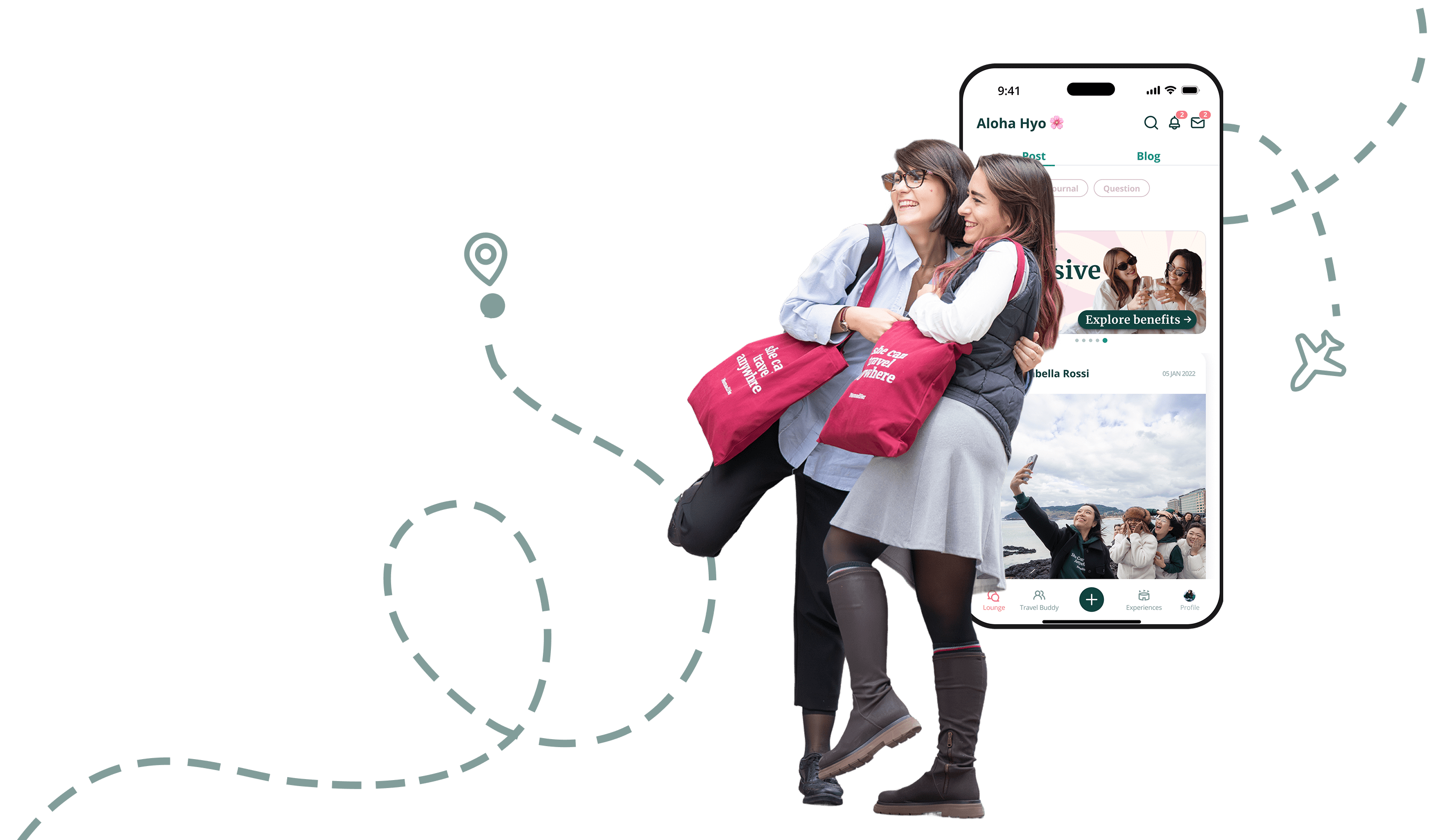 Two NomadHer members laughing together next to the NomadHer app on a phone