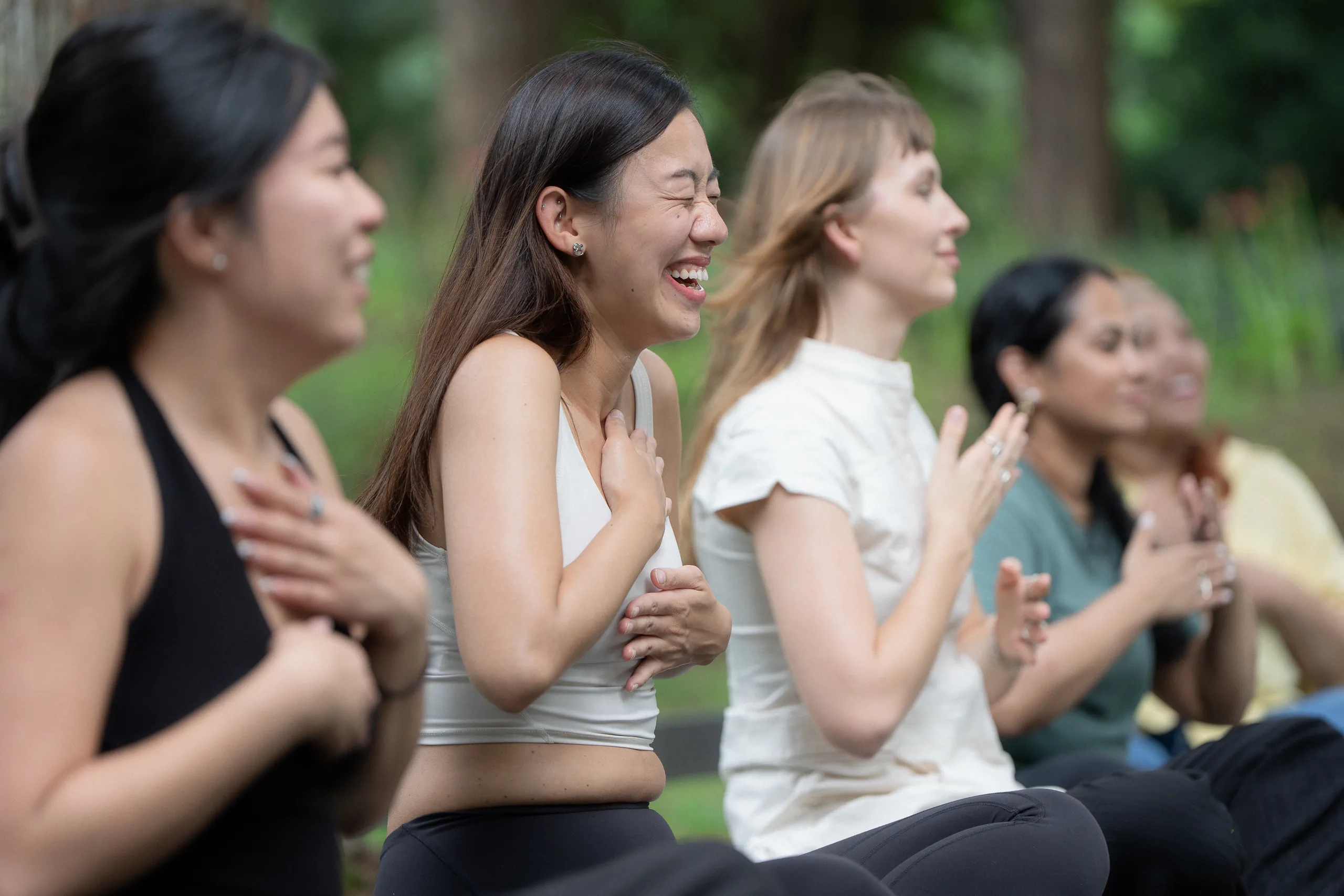 Women laughing together on a group camp