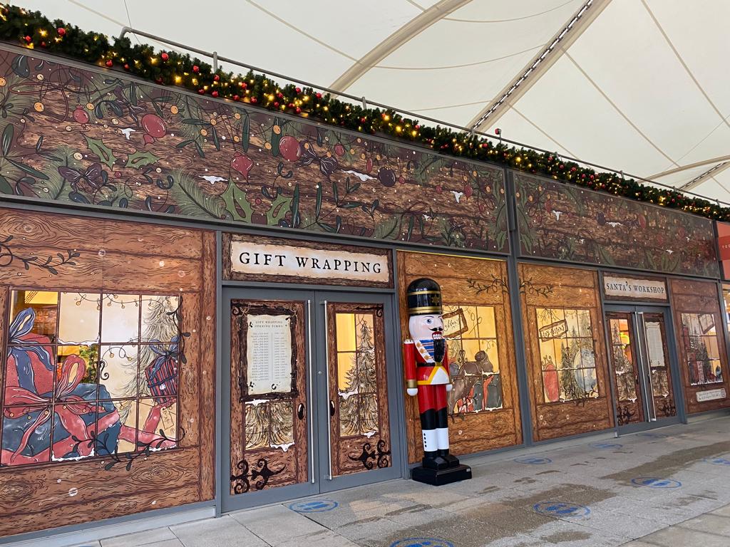 Photo of christmas store front that was illustrated and printed