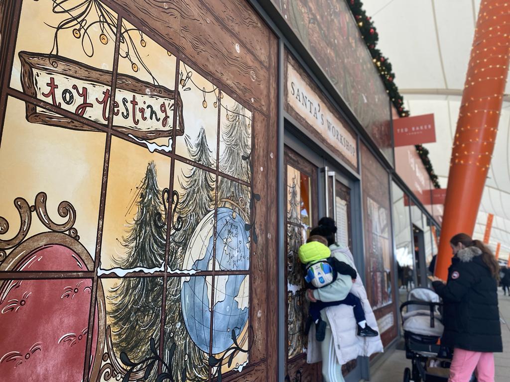 Photo of christmas store front that was illustrated and printed