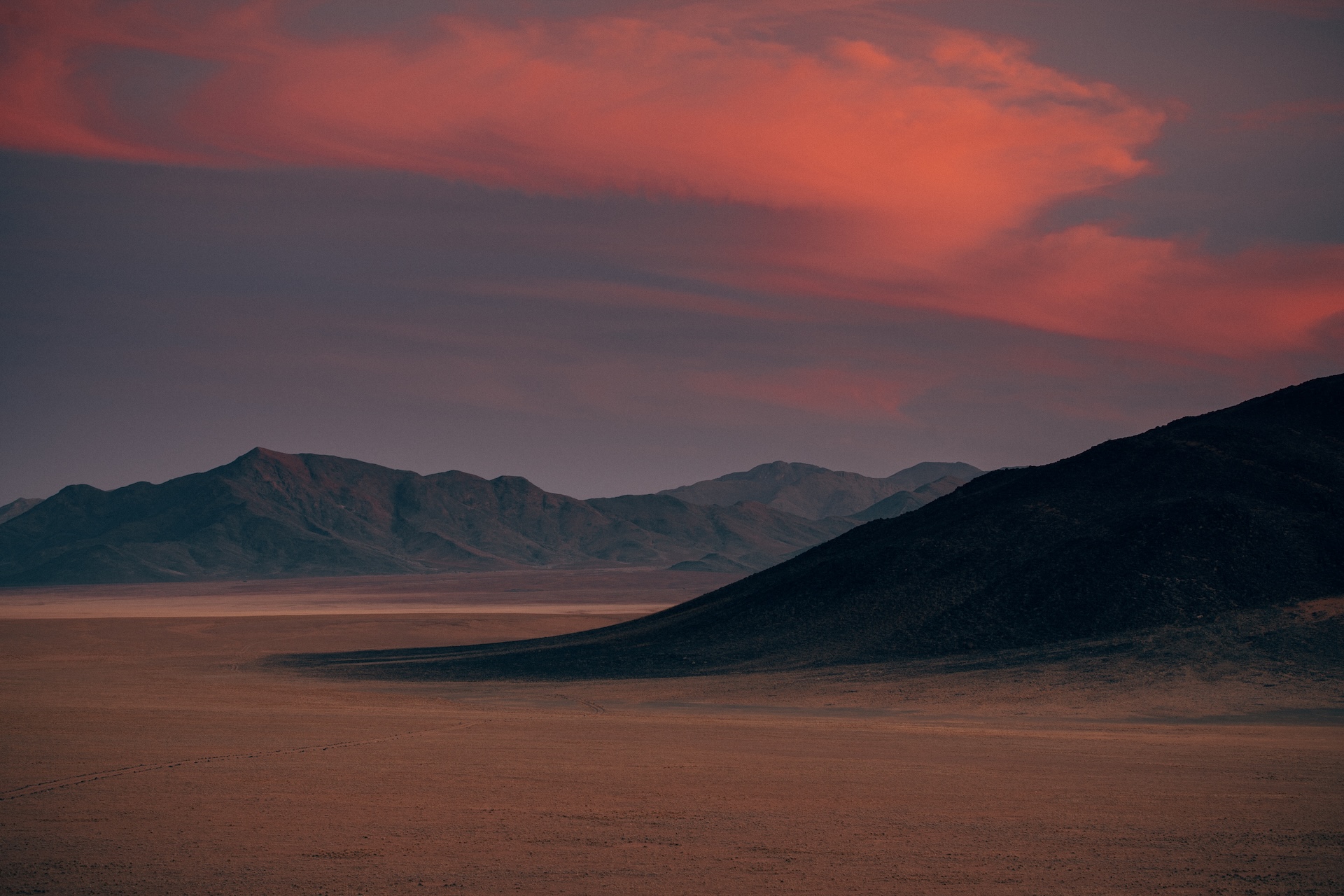 Weitblick über die Grasebenen des NamibRand Nature Reserve, Namibia