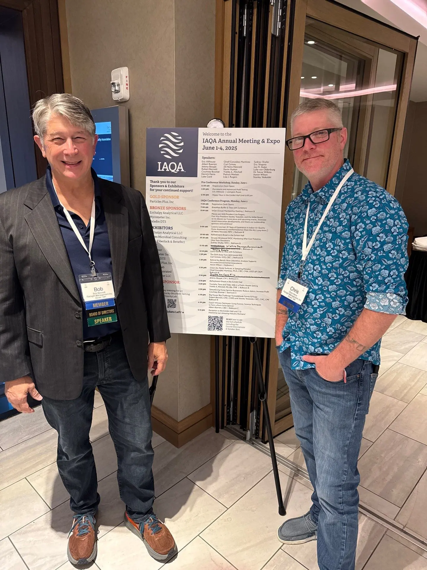 farsight team in front of iaqa schedule board