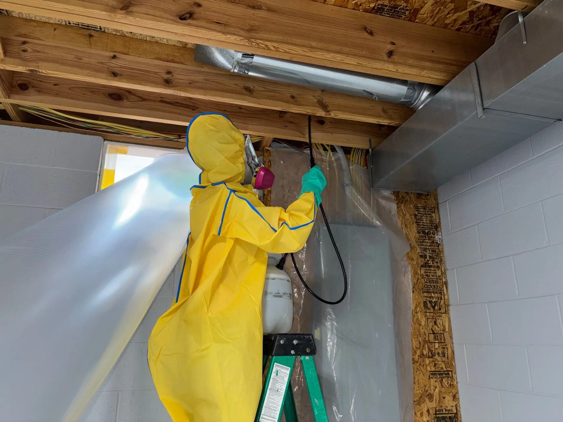 hazmat worker in basement