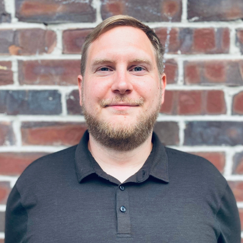 Headshot for Alex Wade, NetBenefit Software