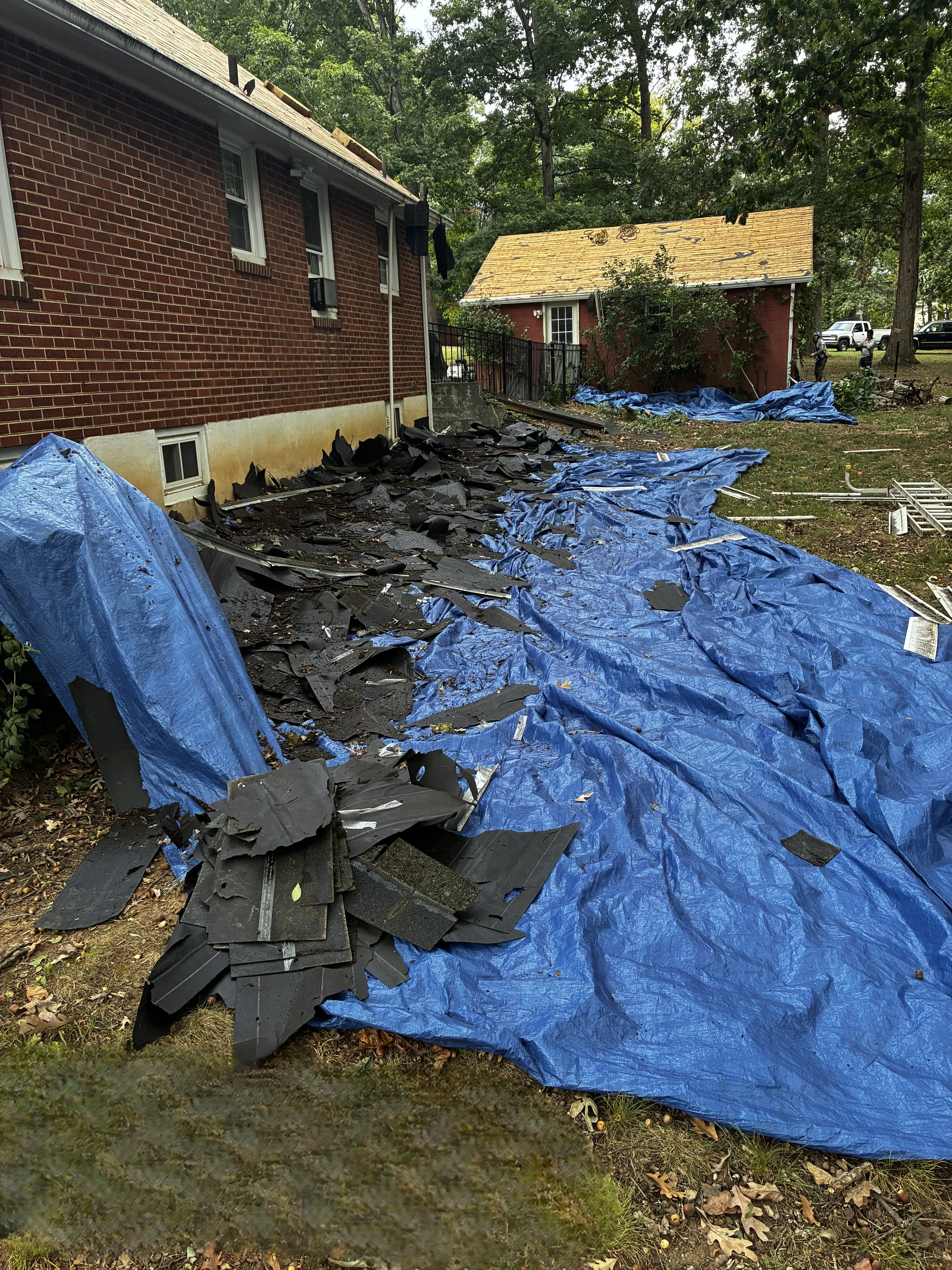 Tear-off stage showing old shingles removed in Salem VA roof replacement.
