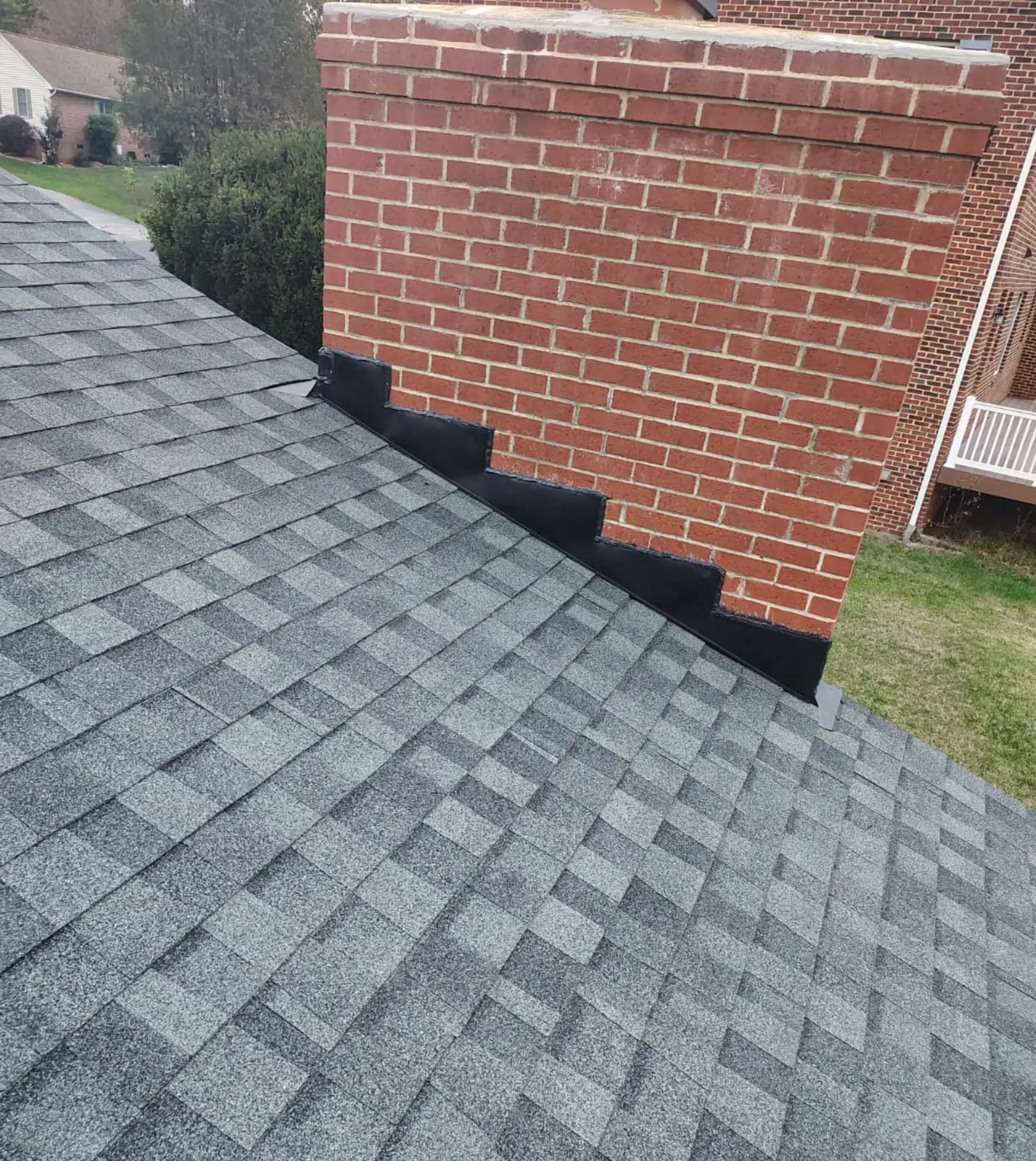 Chimney flashing on this roof replacement in Harrisonburg