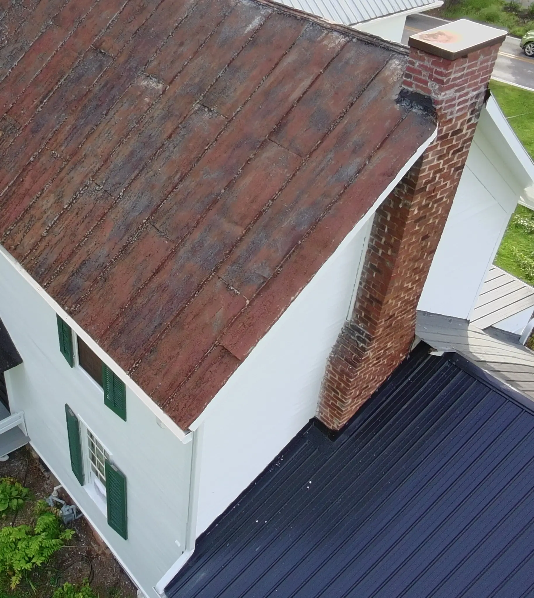 Old metal roof needing replacement by Cenvar Roofing