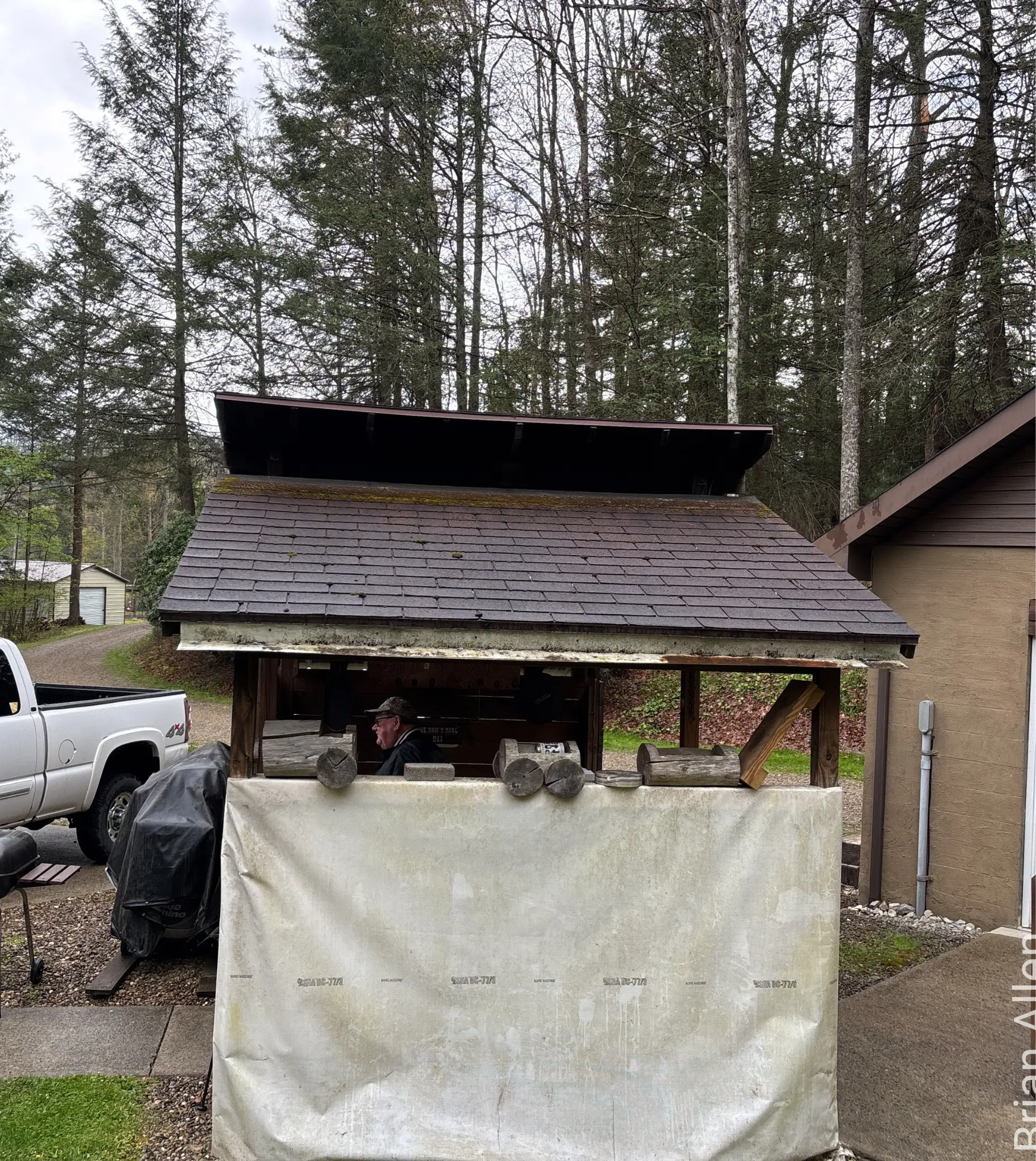 West Virginia home receiving an insurance-required shingle and metal roof replacement estimate from the Cenvar Roofing Charleston branch