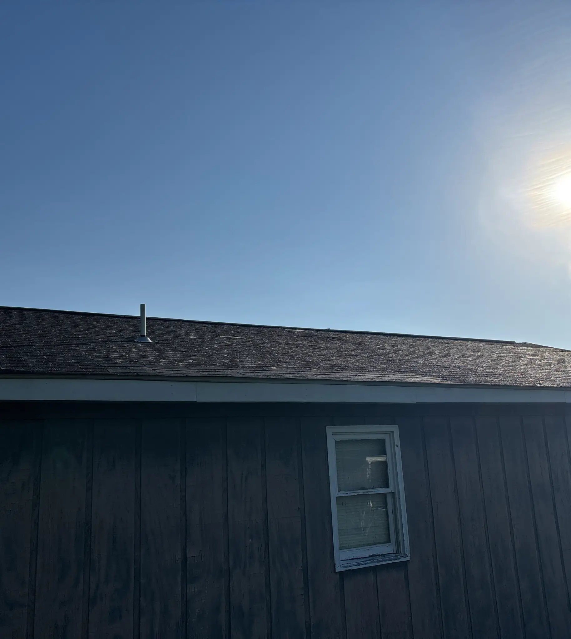 One-story West Virginia home receiving a proactive shingle roof replacement from the Cenvar Roofing Huntington branch