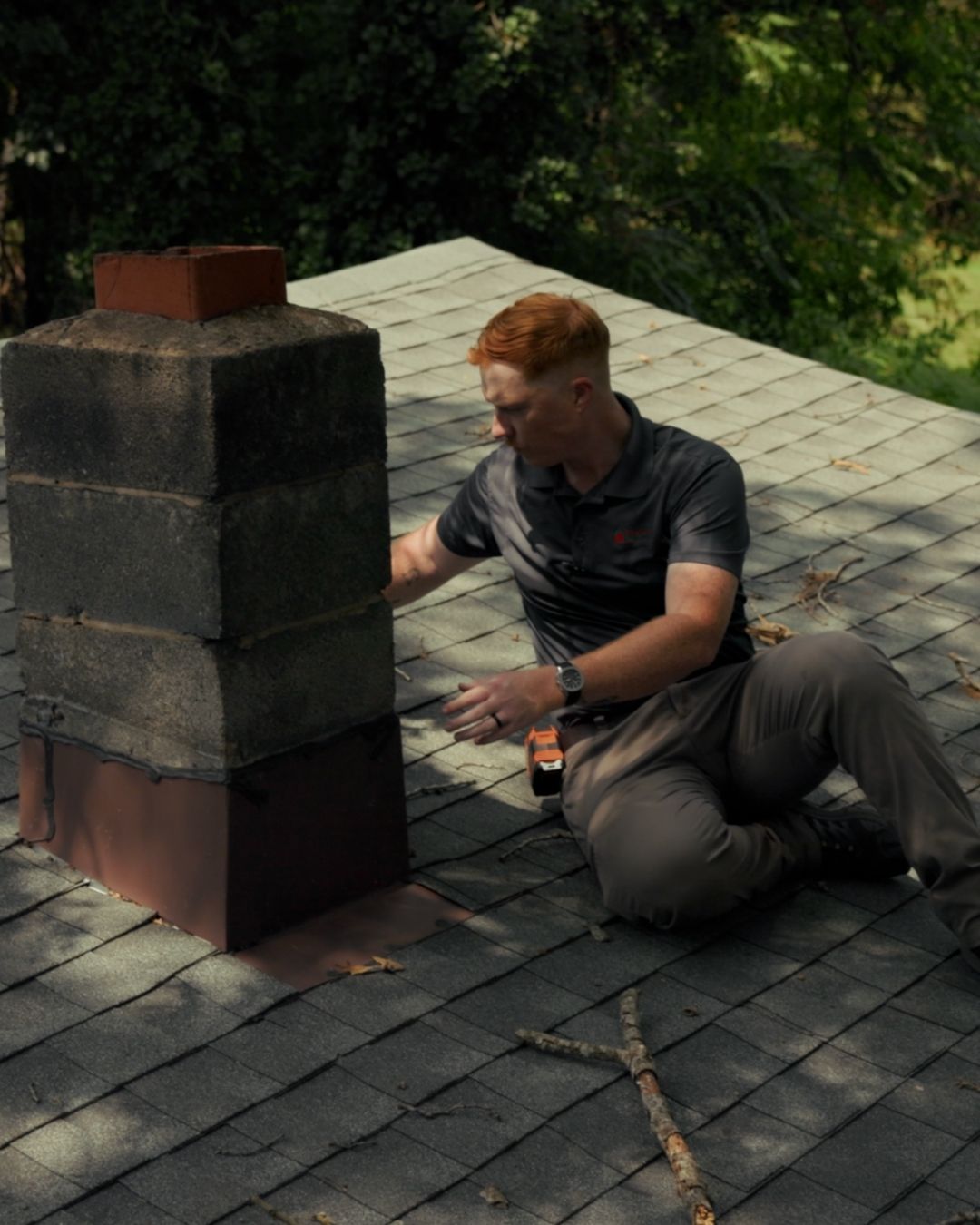 Roof inspector, inspecting chimney
