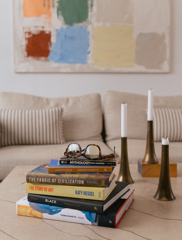 Thomas Schutte book, in a stack of books on a coffee table