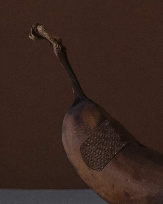 A banana wearing a plaster