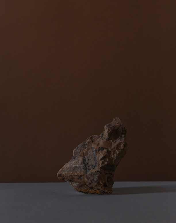 A rock wearing a plaster