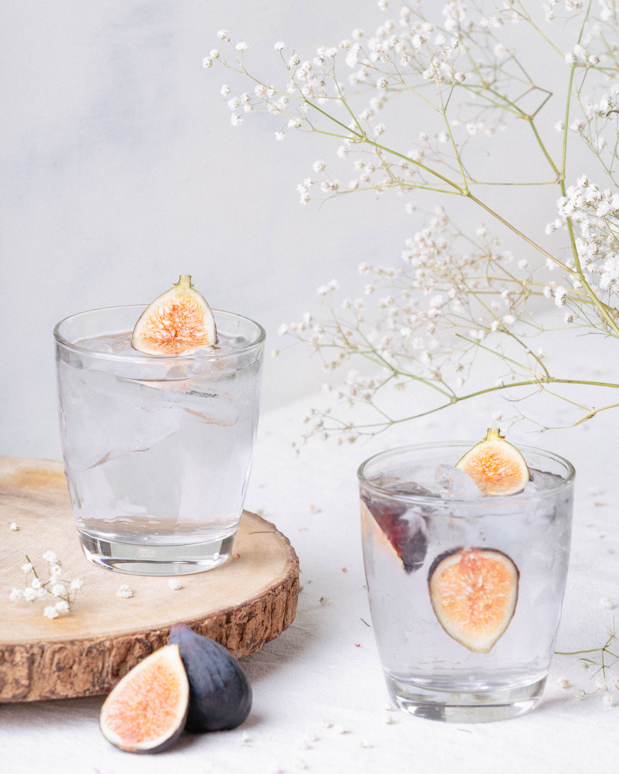 Photo of two glasses and figs