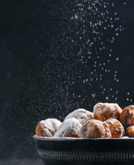 Photo of aebleskiver, a Danish baked good