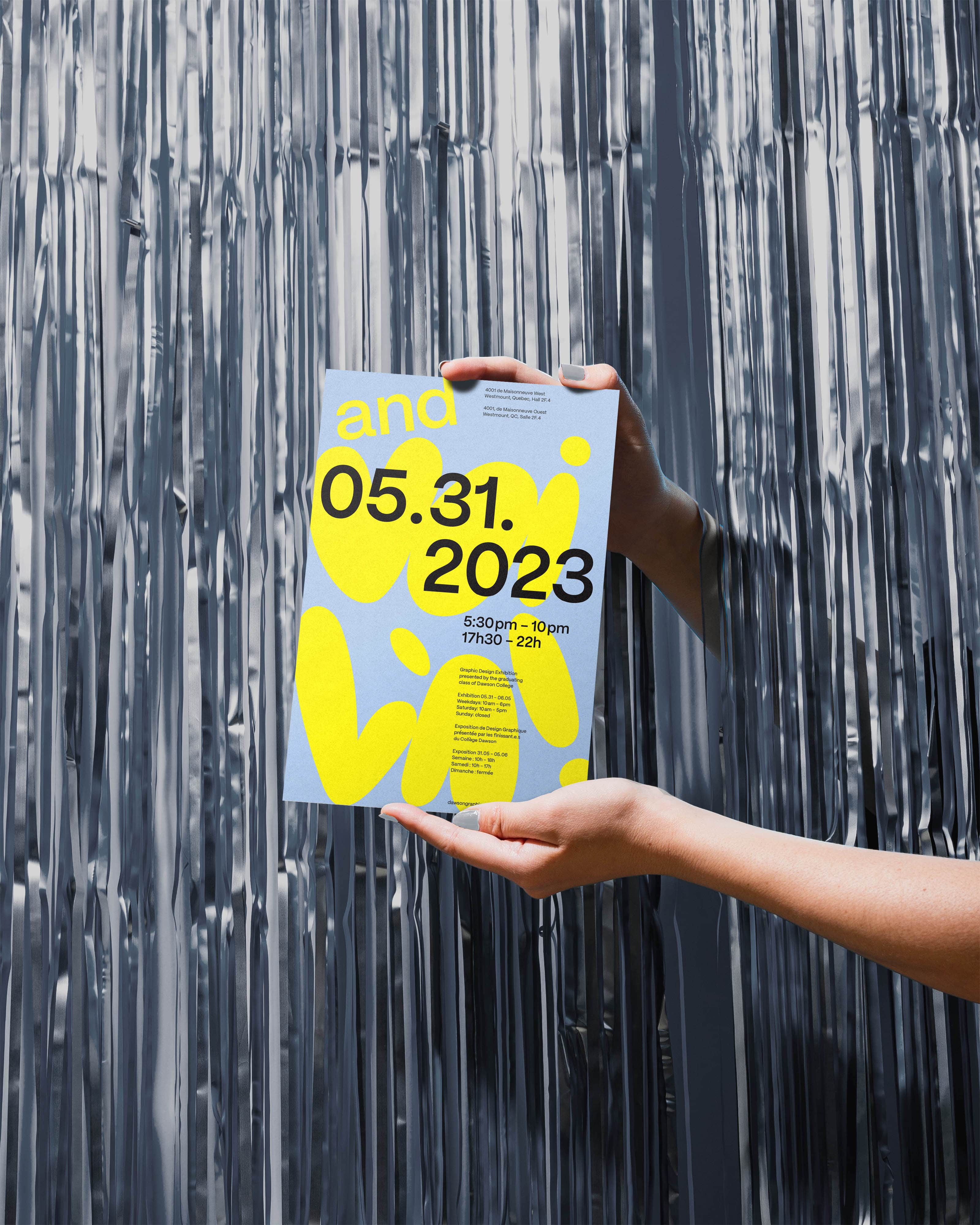 Hands holding the And Voila poster.