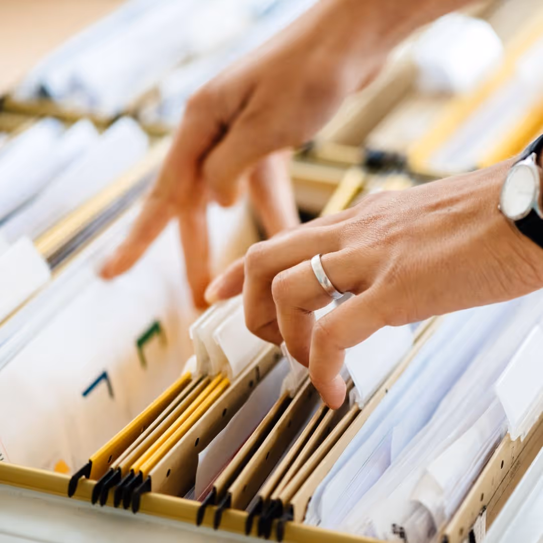 Person looking through files