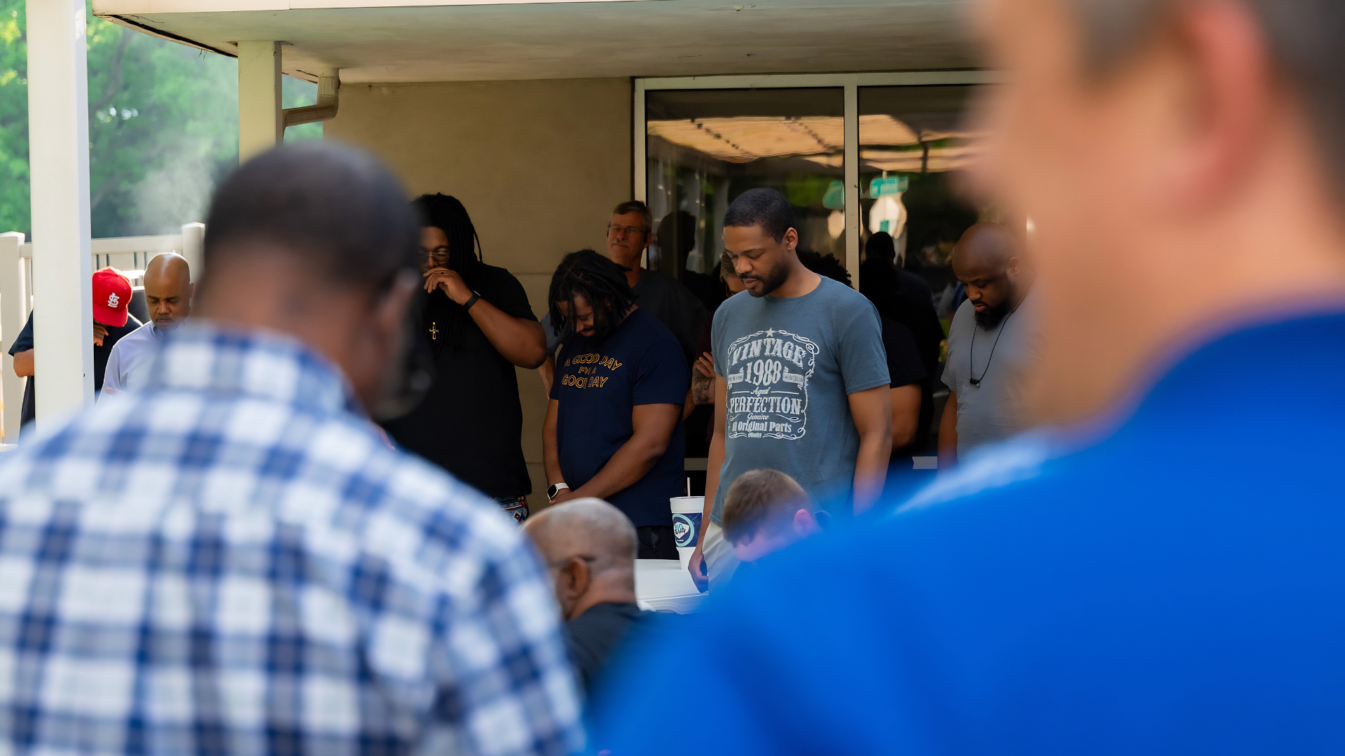 A young woman getting baptized.