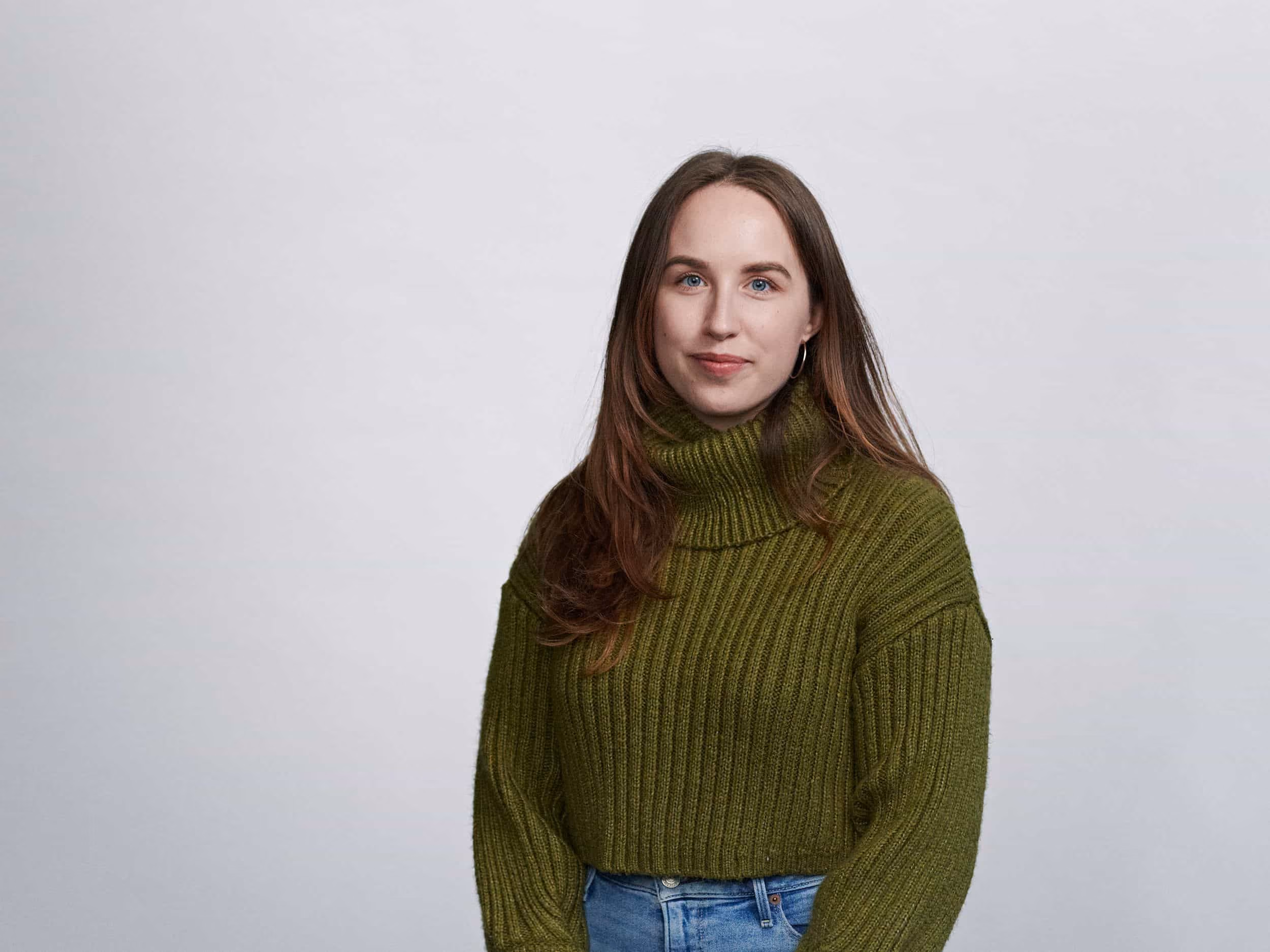 A professional photograph of Amber Lyon