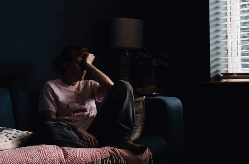 Woman struggling with an eating disorder