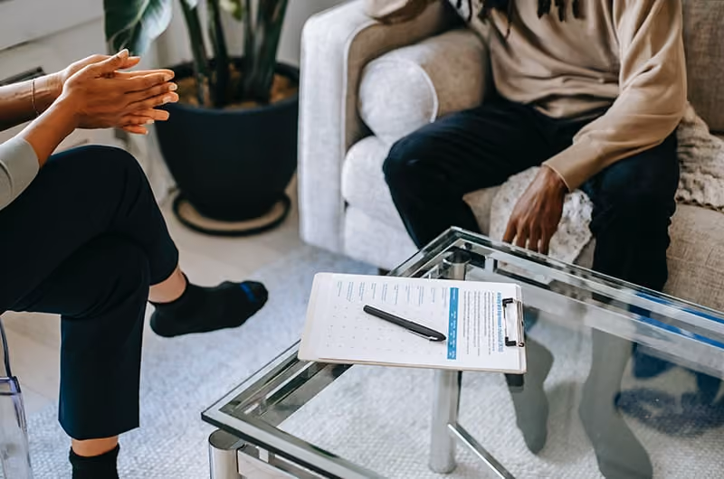 A therapist and her client during a therapy session
