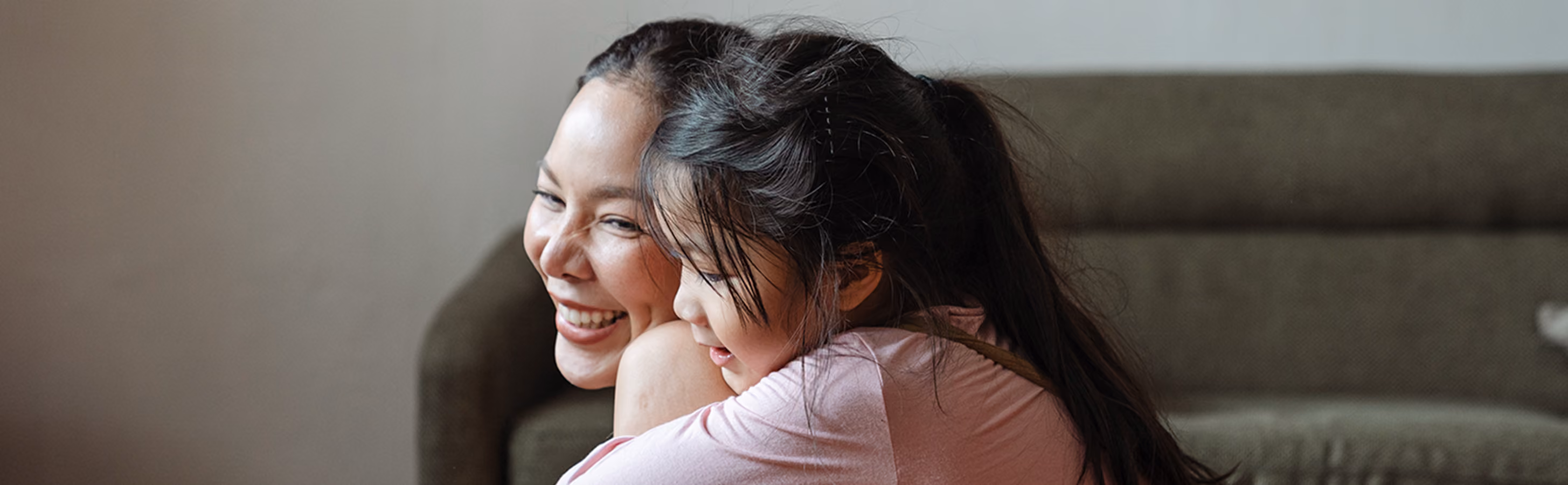 Mom with daughter on her back