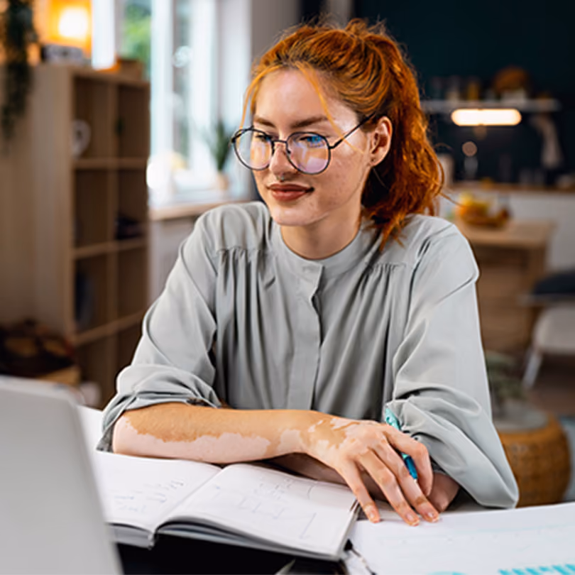 Female employee works with a coach on career challenges