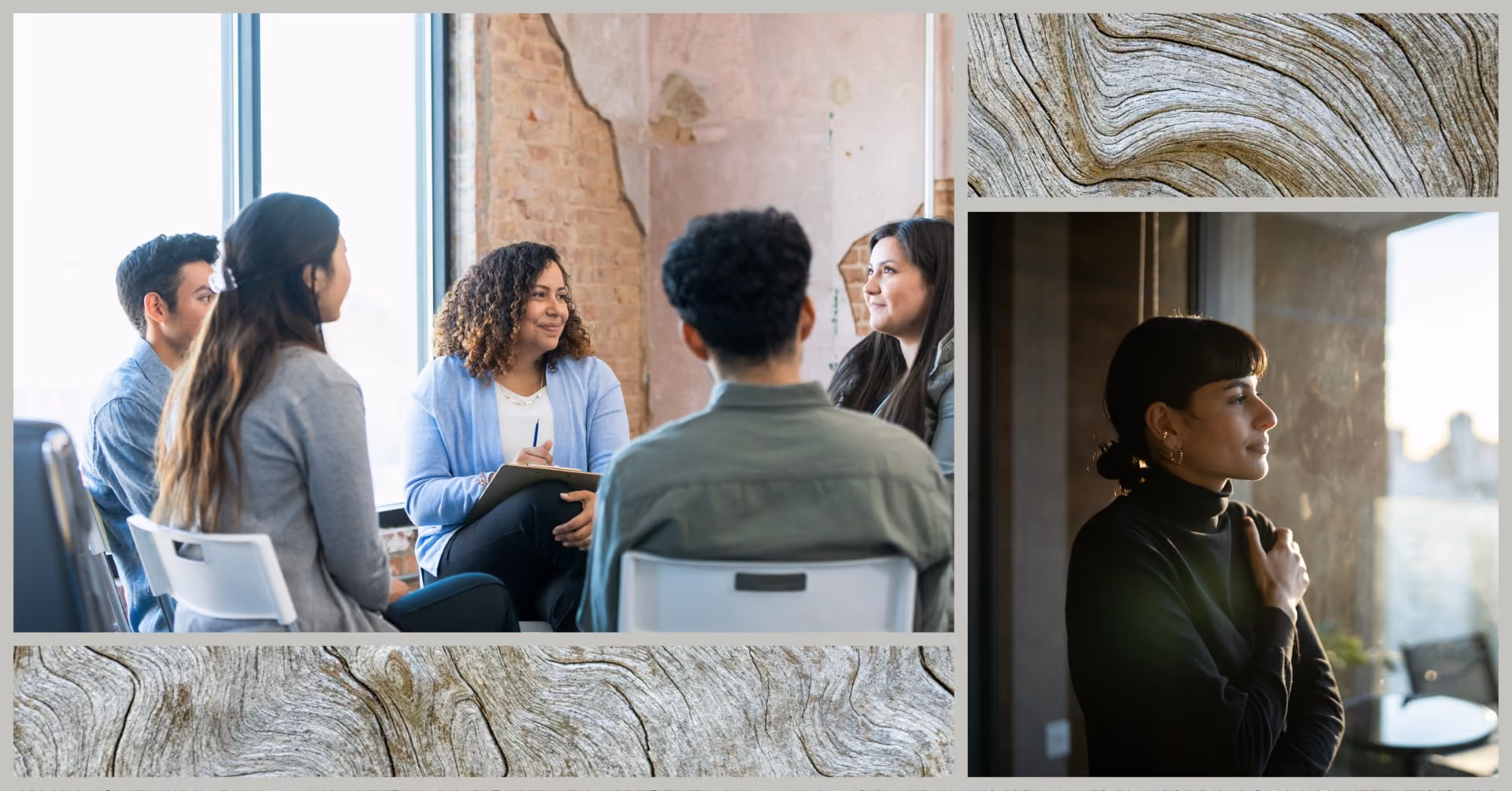 Woman holds herself as she stares out office window