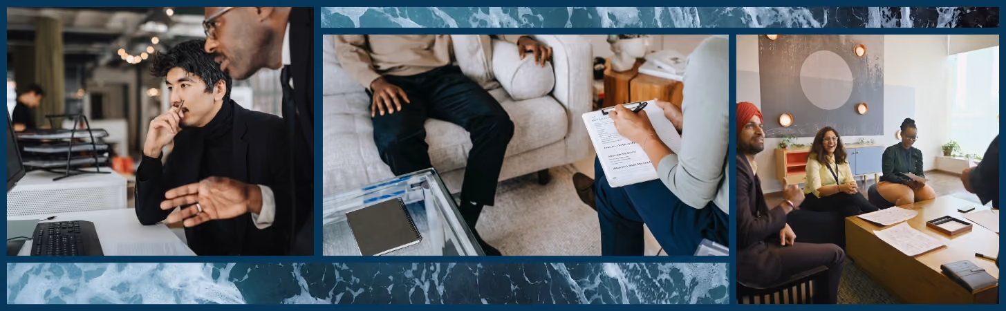 Two men collaborate at an office desk