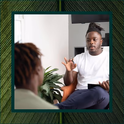 A man in a coaching session with another man