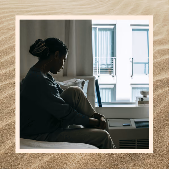 A woman sitting in a hospital bed
