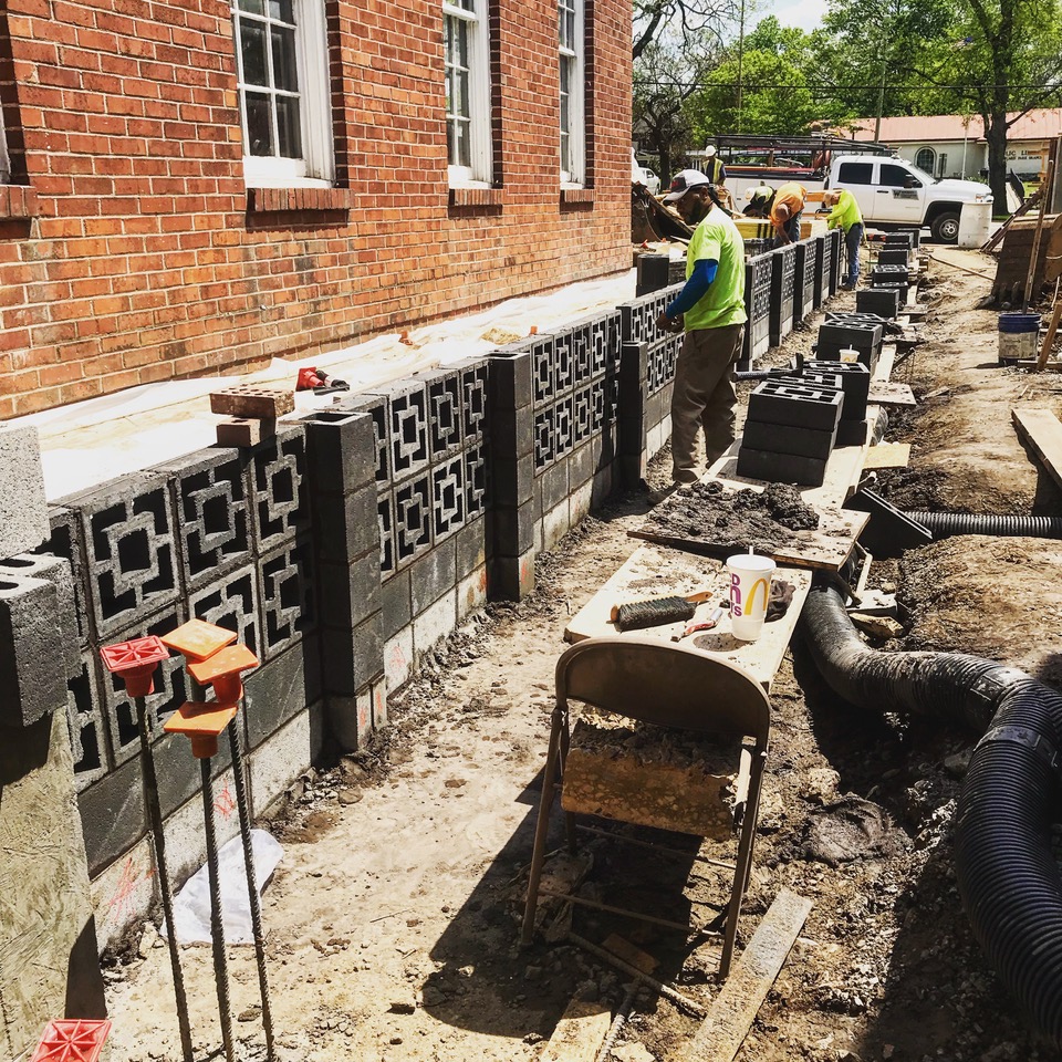 Mid-century breezeway black block wall laid