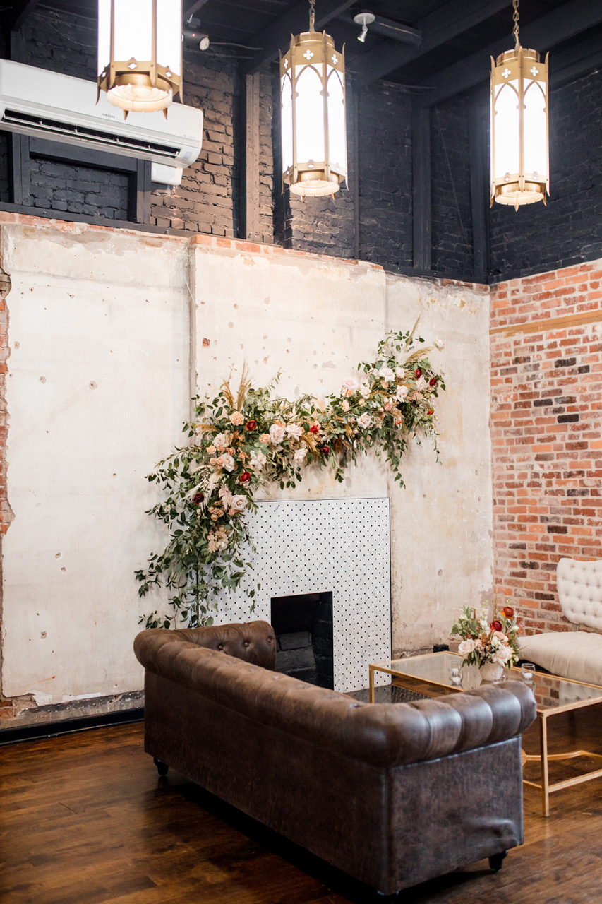 Floral arrangement over restored fireplace