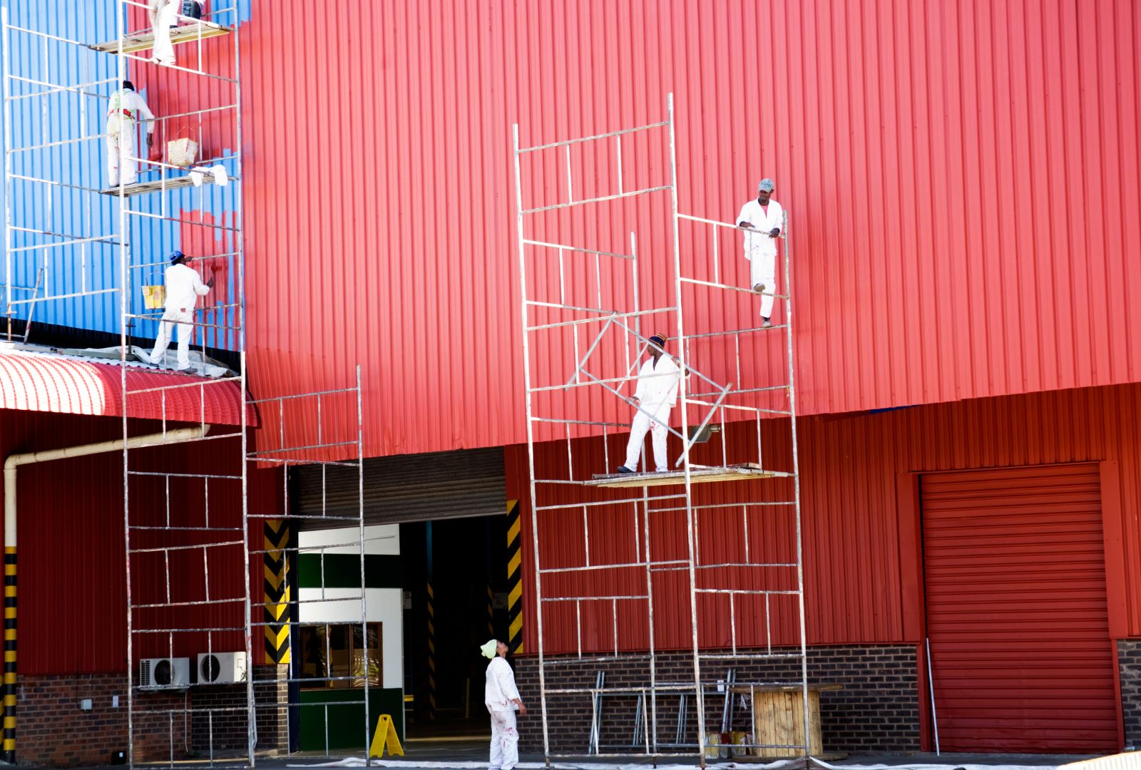 Essential Considerations for Warehouse Painting: Quality, Safety, and Compliance