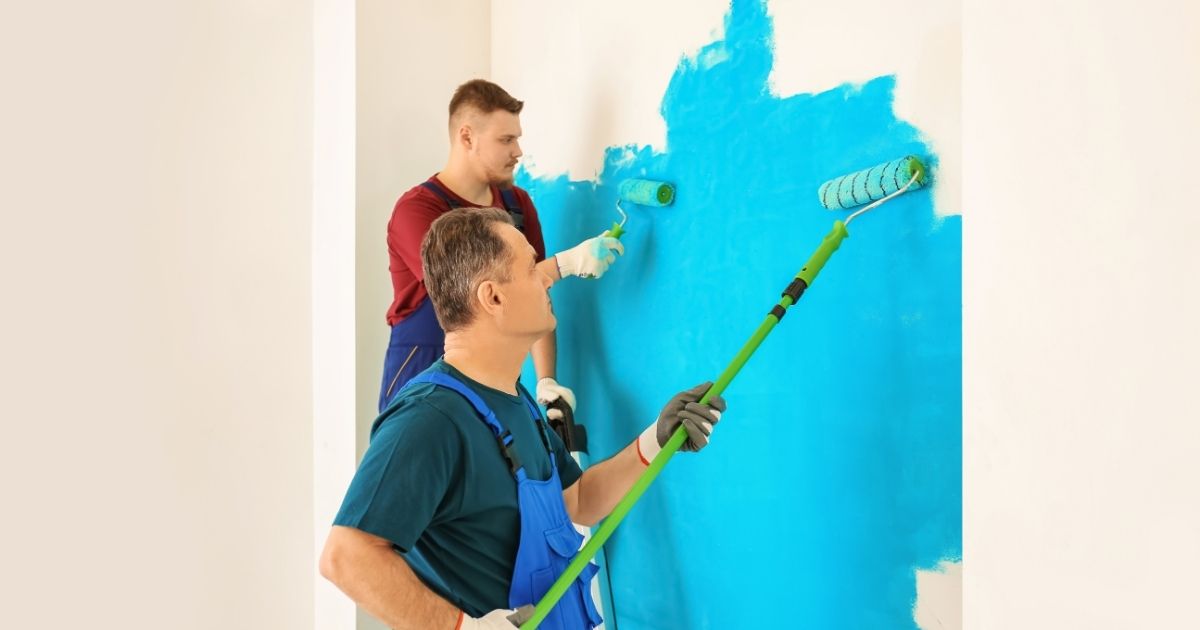 Male Painters in Uniform Working Indoors
