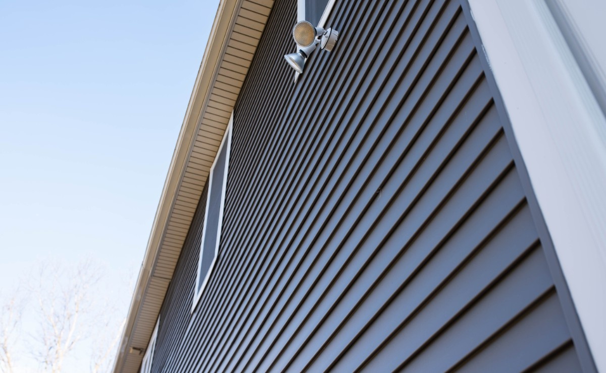A Bellevue home that opted to use darker colors for vinyl siding
