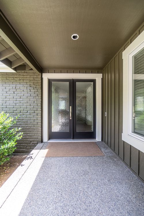 Gray exterior home after professional paint job in Palestine, TX