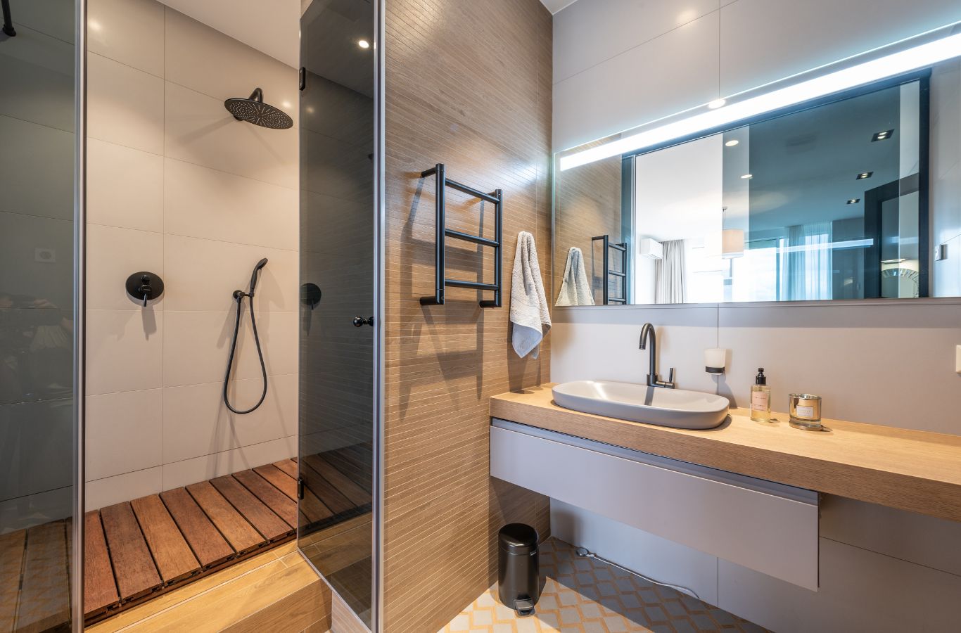 A NEW DAY Construction employee working on a bathroom remodeling project in Maltby, WA, using advanced tools and precision for expert-level results.
