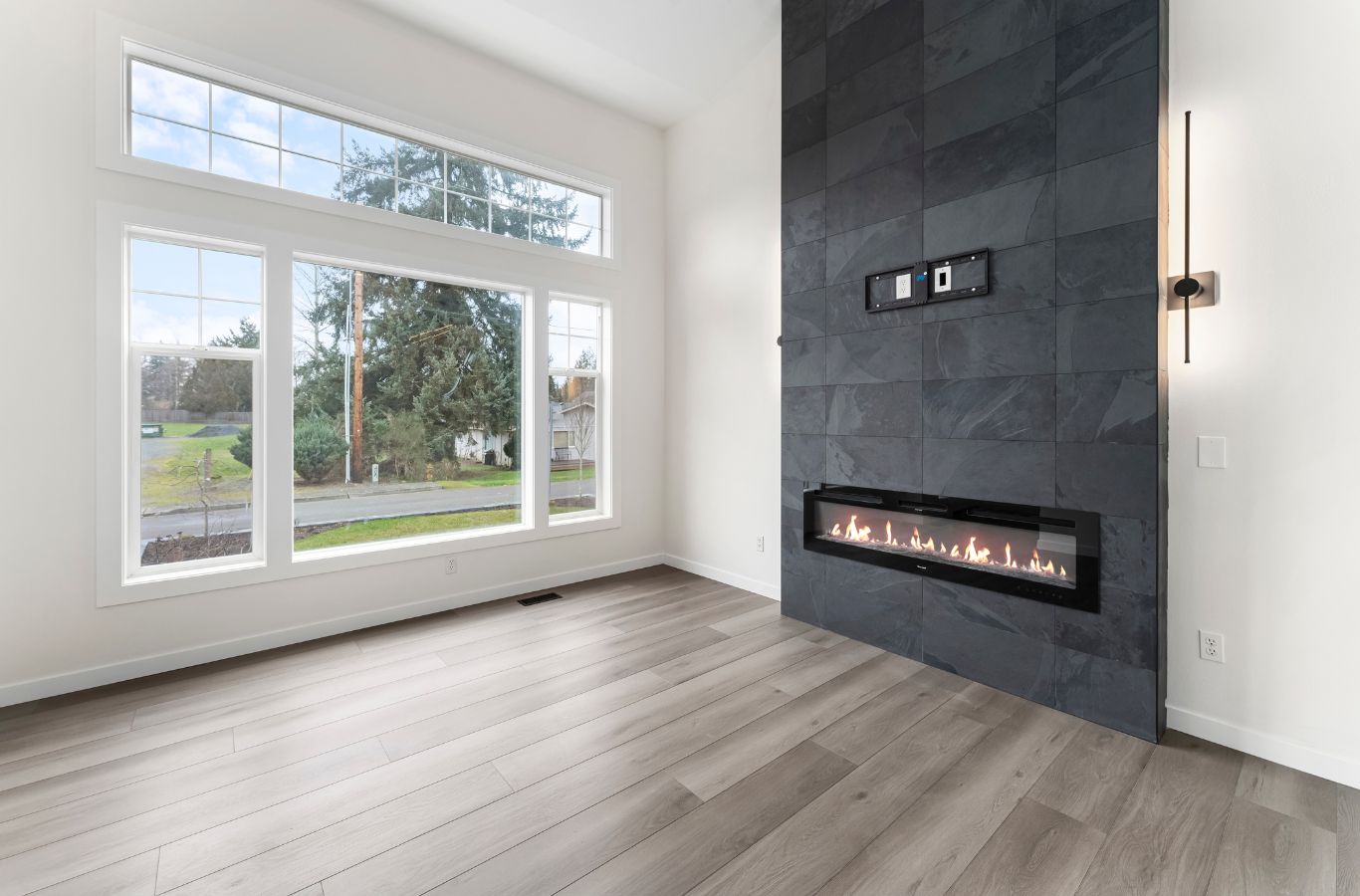 A NEW DAY Construction professional enhancing a Bellevue, WA home exterior through expert home remodeling, showcasing quality craftsmanship and trusted local service.