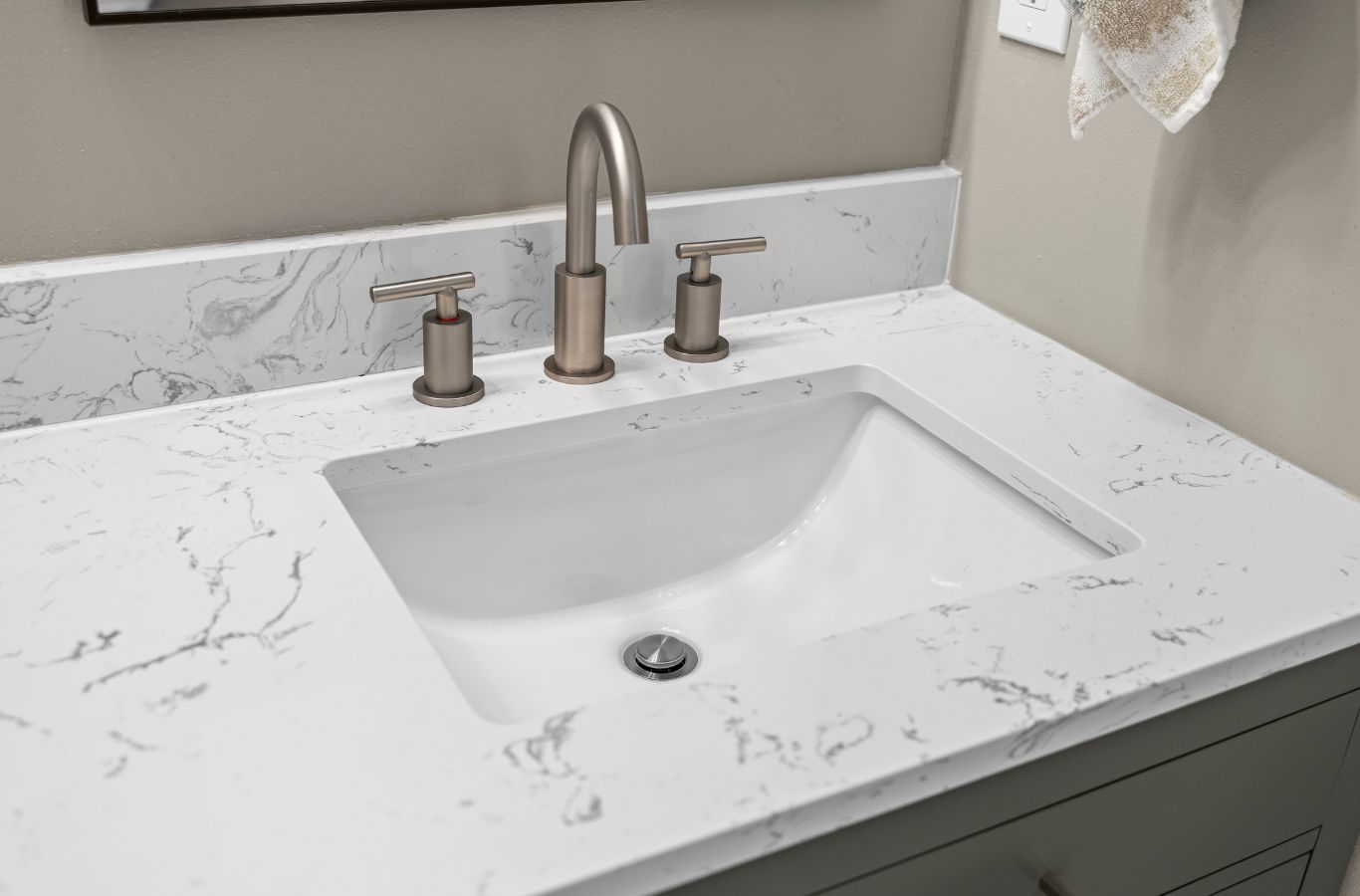 A NEW DAY Construction specialist renovating a bathroom in Redmond, WA, showcasing quality craftsmanship, detailed finishes, and reliable remodeling services.