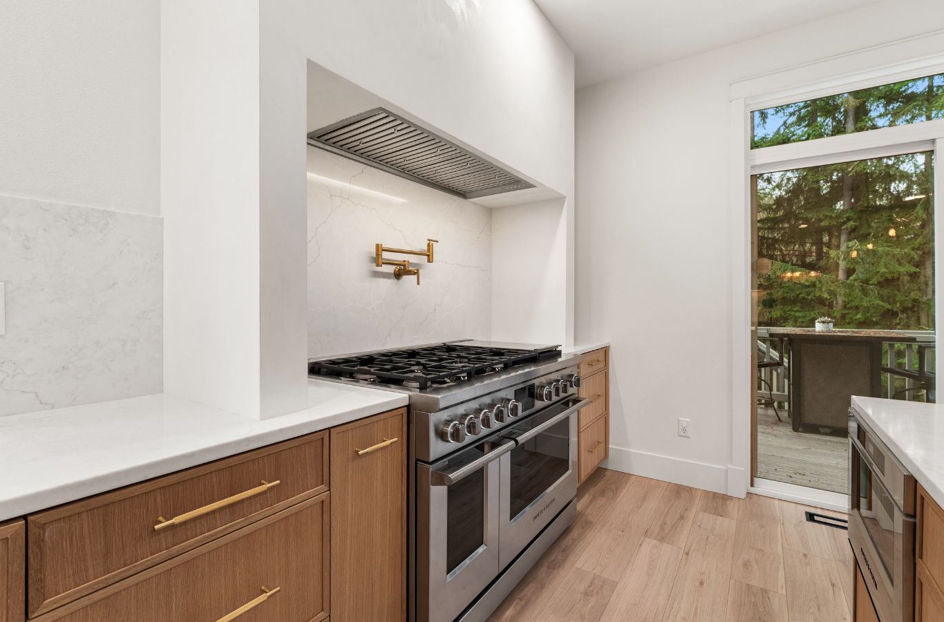 A NEW DAY Construction expert upgrading a kitchen in Kenmore, WA, highlighting functional layouts, stylish finishes, and the value of professional remodeling expertise.