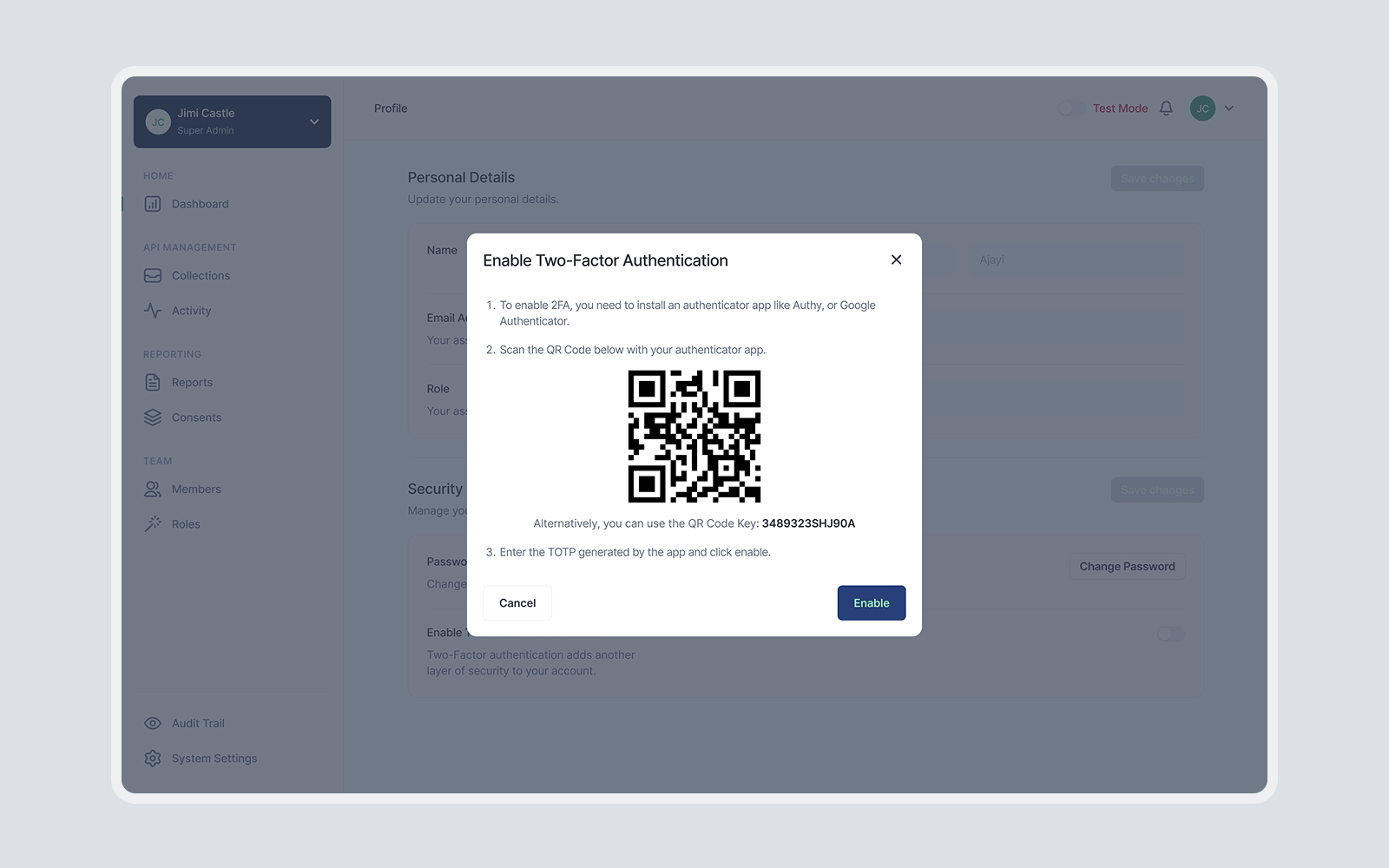 Popup window titled 'Enable Two-Factor Authentication' with instructions to install an authenticator app and scan a QR code or use a key, with Cancel and Enable buttons.
