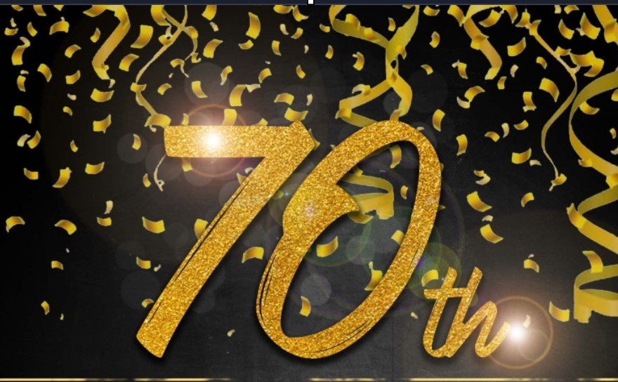 black background with gold confetti and streamers. 70th is written