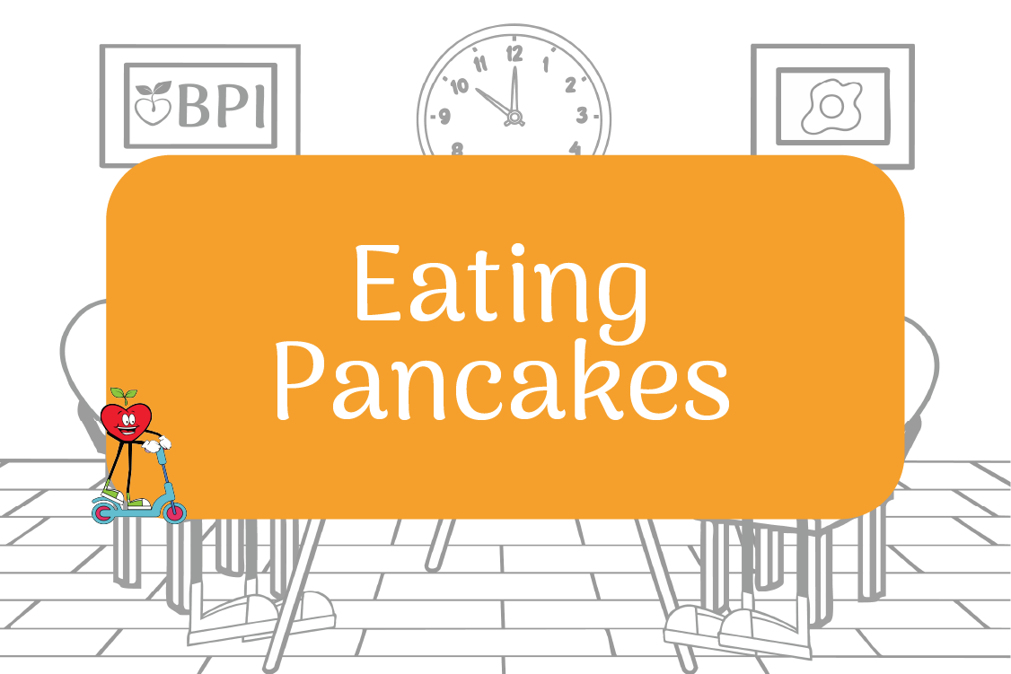 Eating Pancakes Happy Apples sitting down at table