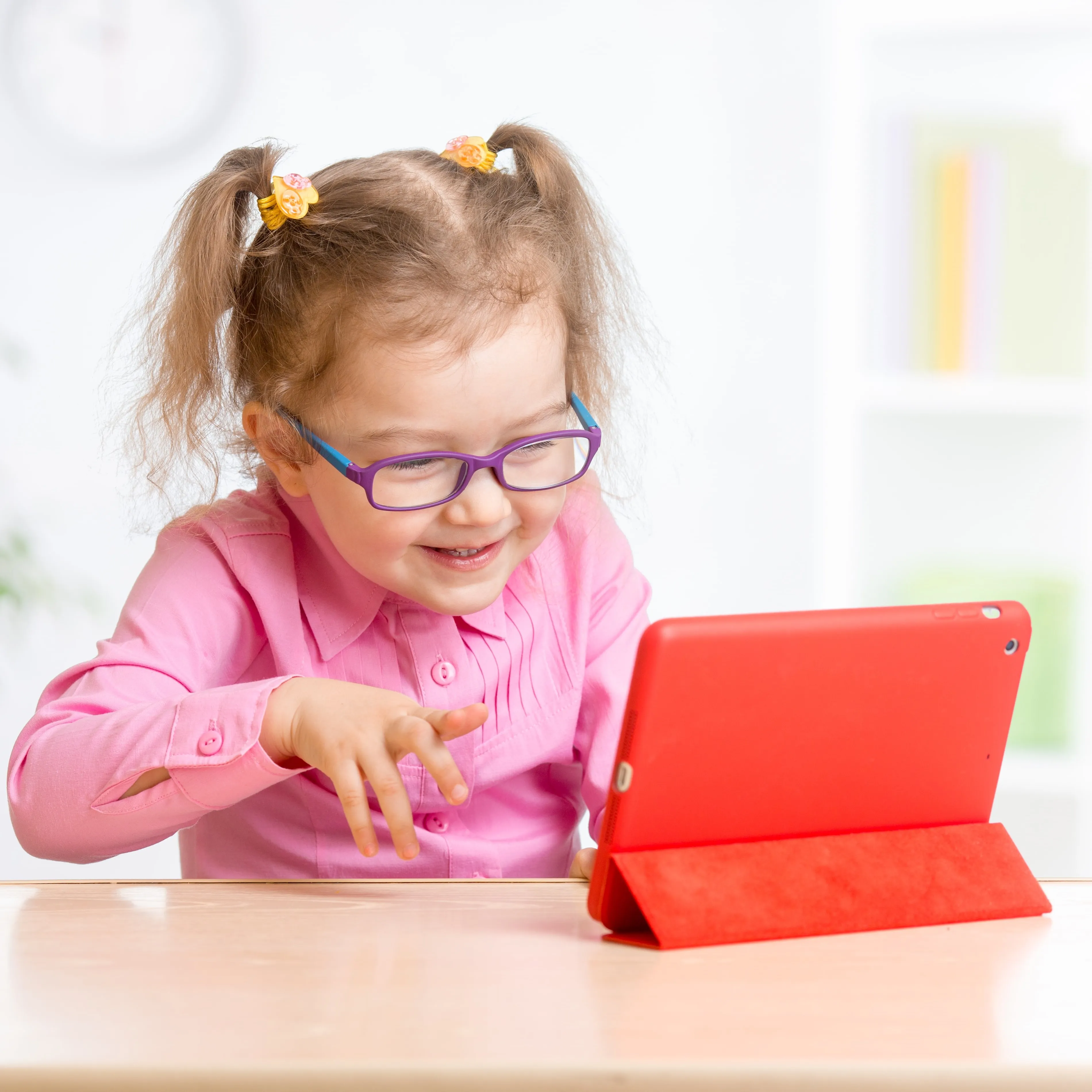 Child with iPad.
