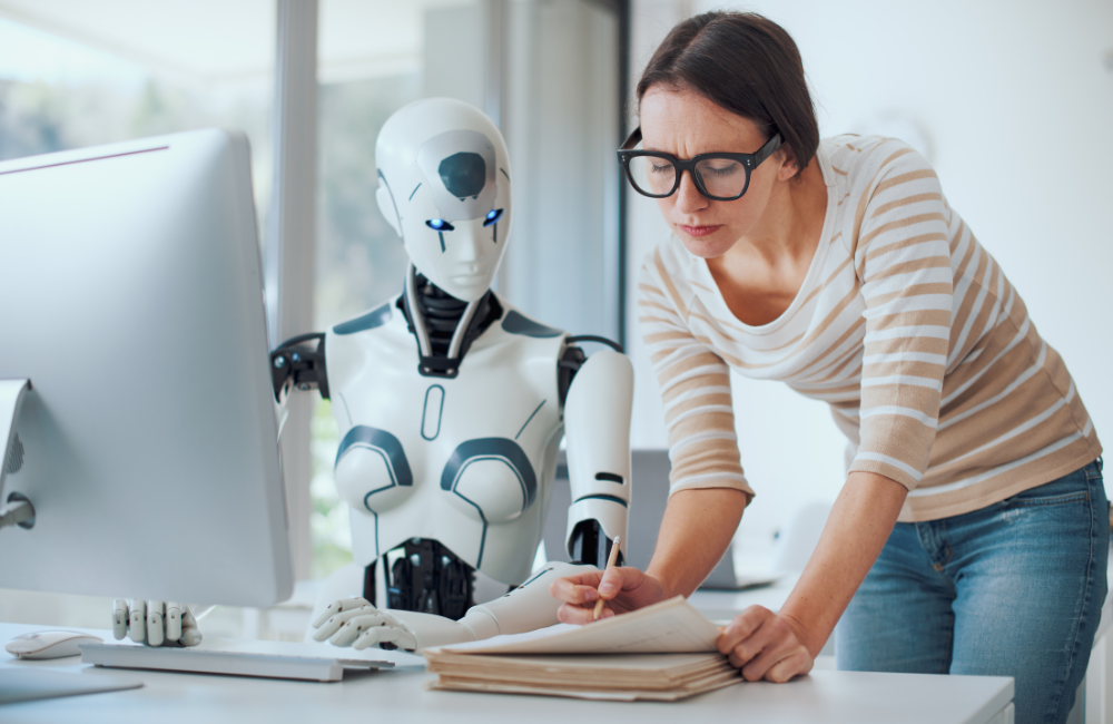 A woman helping AI in the workplace.