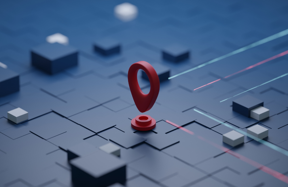 A red Google Maps pin pointing down on computer mainframe.